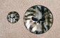 Punisher stretching through black and silver Flag Harley derby and points cover