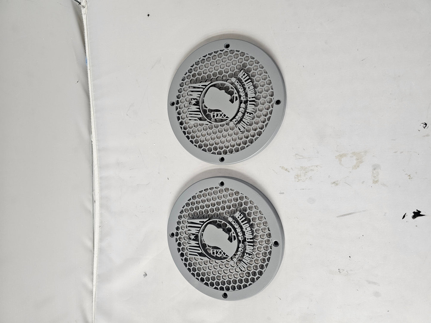 A set of POW MIA 14-23 Harley Davidson Touring Pack Speaker Grill Cover Guard
