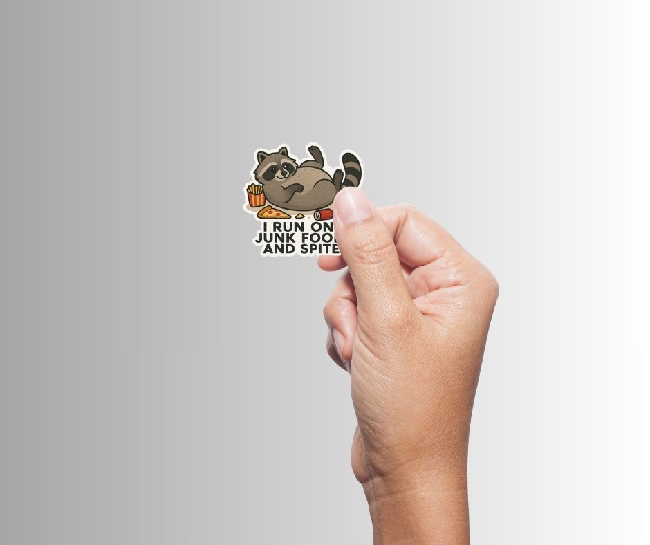 "I Run on Junk Food and Spite" Funny Raccoon Sticker