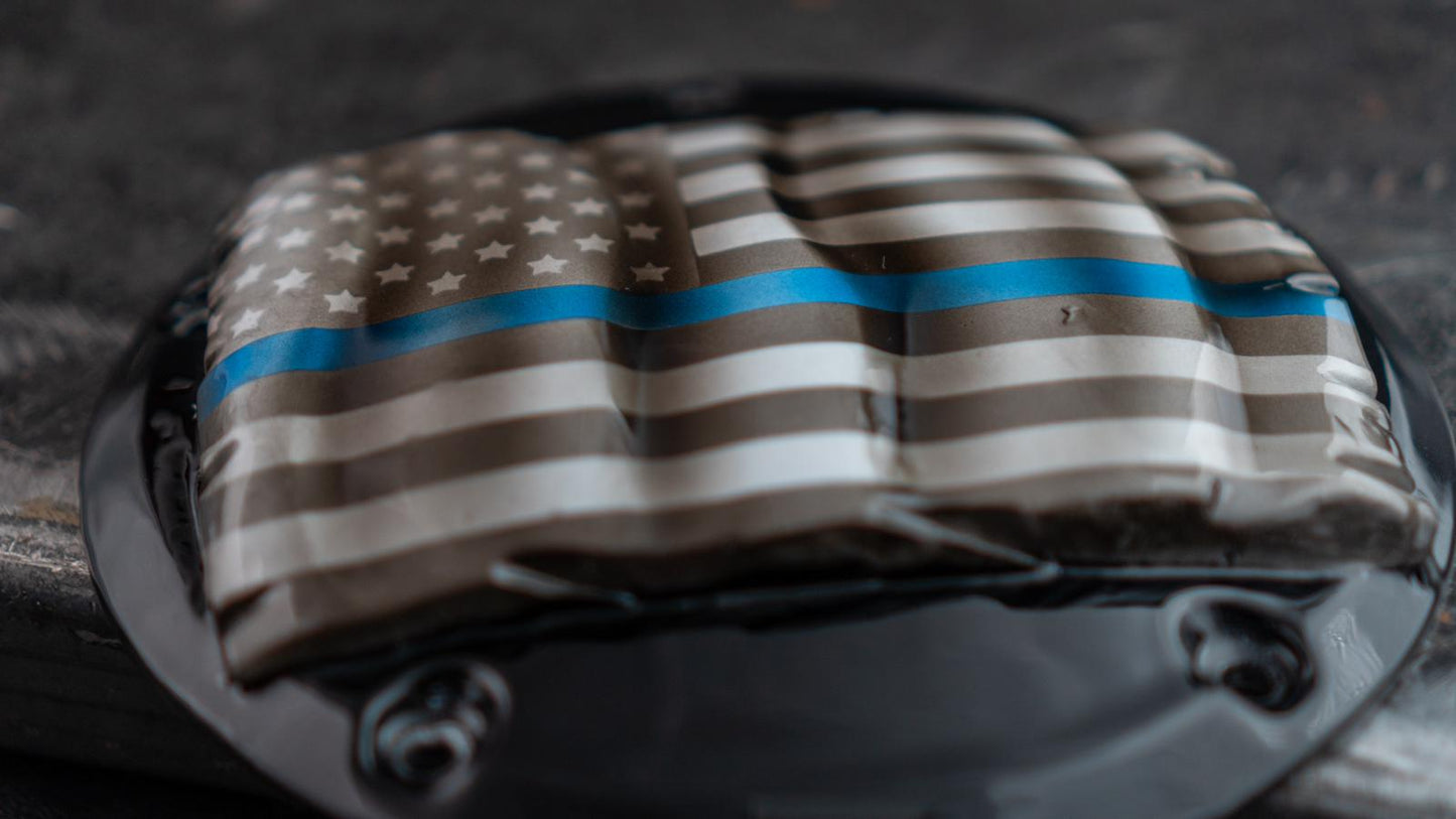 3D tattered American flag with script derby cover