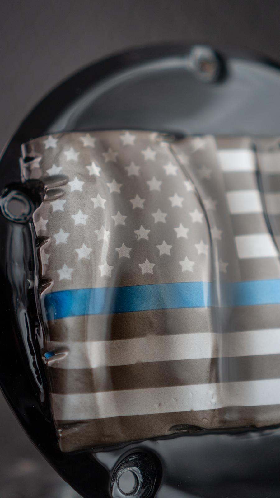 3D tattered American flag with script derby cover